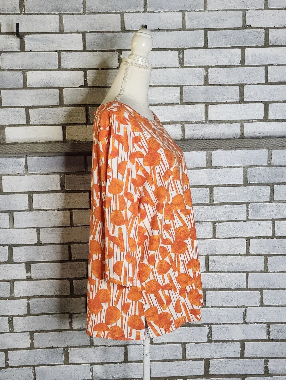 Belle by Kim Gravel features boatneck